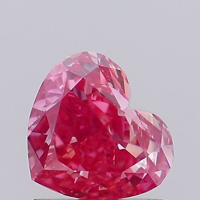 Loose Diamond - HEART 0.82ct Fancy Vivid Pink VVS1: Loose Diamond - HEART 0.82ct Fancy Vivid Pink VVS1 Source: This is a real non-mined Diamond that has been grown in a lab Shape: HEART Carats: 0.82 Color: Fancy Vivid Pink Certification: IGI Video: