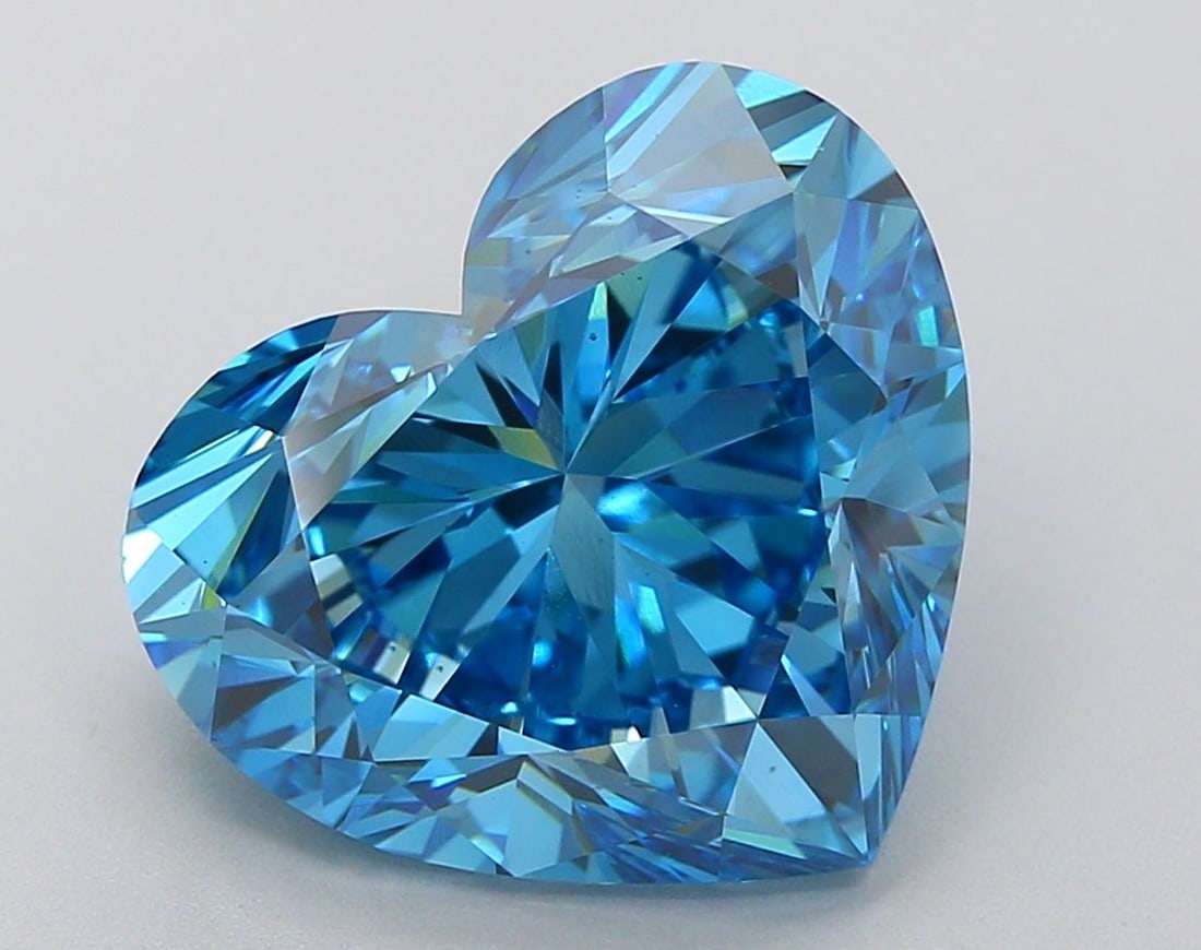 Loose Diamond - HEART 9.1ct Fancy Vivid Blue VS1: Loose Diamond - HEART 9.1ct Fancy Vivid Blue VS1 Source: This is a real non-mined Diamond that has been grown in a lab Shape: HEART Carats: 9.1 Color: Fancy Vivid Blue Certification: IGI Video: