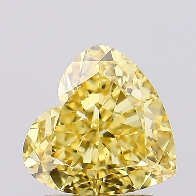 Loose Diamond - HEART 1.72ct Fancy Vivid Yellow VS1: Loose Diamond - HEART 1.72ct Fancy Vivid Yellow VS1 Source: This is a real non-mined Diamond that has been grown in a lab Shape: HEART Carats: 1.72 Color: Fancy Vivid Yellow Certification: IGI Video: