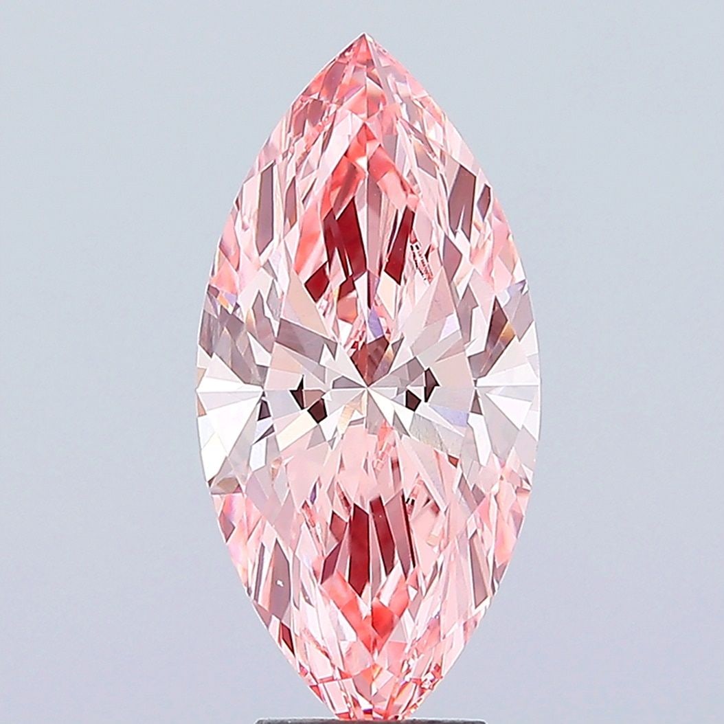 Loose Diamond - MARQUISE 5.04ct Fancy Vivid Pink VVS2: Loose Diamond - MARQUISE 5.04ct Fancy Vivid Pink VVS2 Source: This is a real non-mined Diamond that has been grown in a lab Shape: MARQUISE Carats: 5.04 Color: Fancy Vivid Pink Certification: IGI Vide