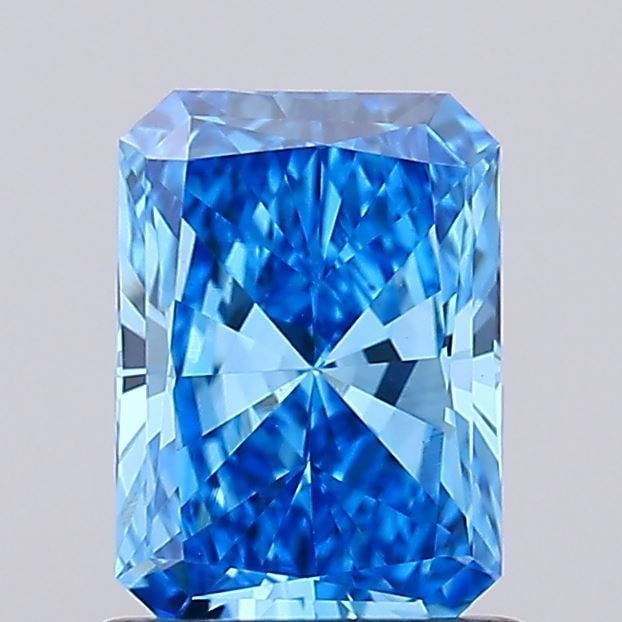 Loose Diamond - RADIANT 0.93ct Fancy Vivid Blue VVS2: Loose Diamond - RADIANT 0.93ct Fancy Vivid Blue VVS2 Source: This is a real non-mined Diamond that has been grown in a lab Shape: RADIANT Carats: 0.93 Color: Fancy Vivid Blue Certification: IGI