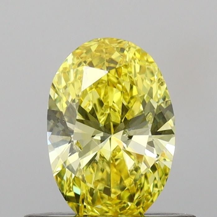 Loose Diamond - OVAL 0.53ct Fancy Vivid Yellow SI1: Loose Diamond - OVAL 0.53ct Fancy Vivid Yellow SI1 Source: This is a real non-mined Diamond that has been grown in a lab Shape: OVAL Carats: 0.53 Color: Fancy Vivid Yellow Certification: IGI Video: