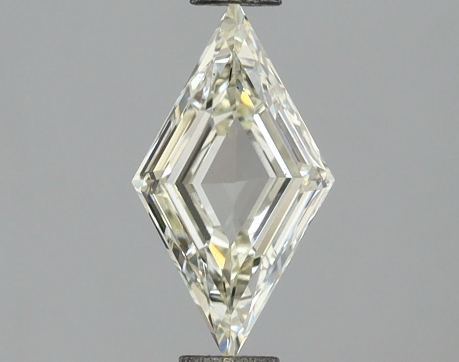 Loose Diamond - LOZENGE 0.6ct Fancy Vivid Yellow VS1: Loose Diamond - LOZENGE 0.6ct Fancy Vivid Yellow VS1 Source: This is a real non-mined Diamond that has been grown in a lab Shape: LOZENGE Carats: 0.6 Color: Fancy Vivid Yellow Certification: NONE Vide