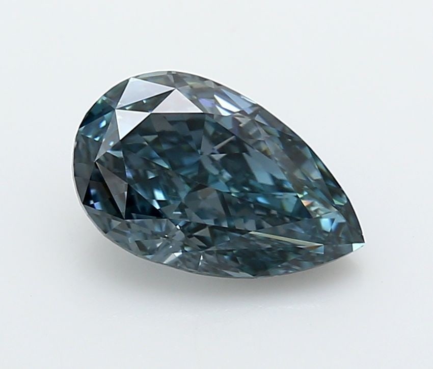 Loose Diamond - PEAR 2.05ct Fancy Vivid Blue VS1: Loose Diamond - PEAR 2.05ct Fancy Vivid Blue VS1 Source: This is a real non-mined Diamond that has been grown in a lab Shape: PEAR Carats: 2.05 Color: Fancy Vivid Blue Certification: IGI Video: