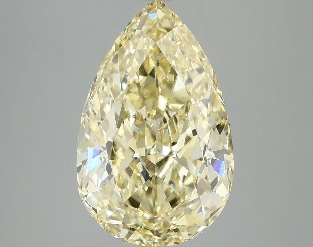 Loose Diamond - PEAR 5.07ct Fancy Vivid Yellow VS1: Loose Diamond - PEAR 5.07ct Fancy Vivid Yellow VS1 Source: This is a real non-mined Diamond that has been grown in a lab Shape: PEAR Carats: 5.07 Color: Fancy Vivid Yellow Certification: IGI Video: