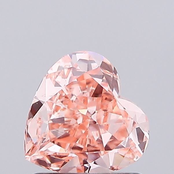 Loose Diamond - HEART 1.03ct Fancy Vivid Orange Pink VS1: Loose Diamond - HEART 1.03ct Fancy Vivid Orange Pink VS1 Source: This is a real non-mined Diamond that has been grown in a lab Shape: HEART Carats: 1.03 Color: Fancy Vivid Orange Pink Certification: I