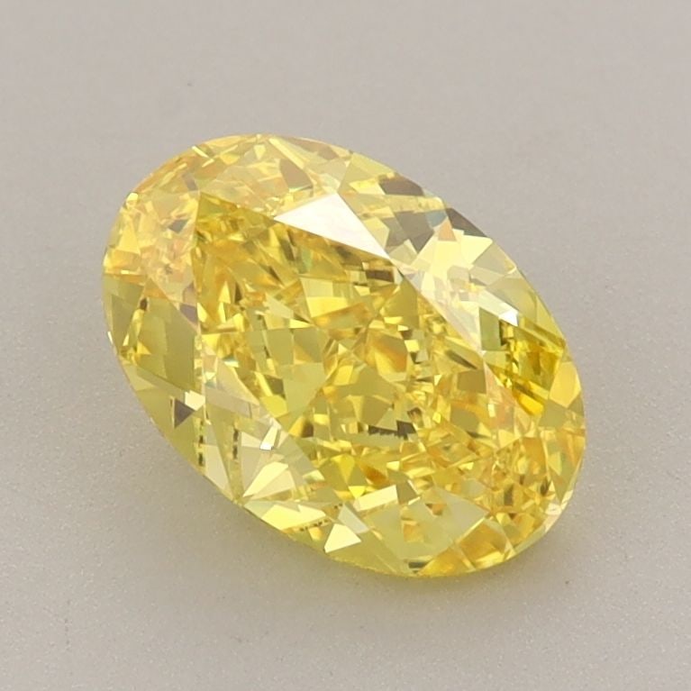 Loose Diamond - OVAL 1.4ct Fancy Vivid Yellow VVS2: Loose Diamond - OVAL 1.4ct Fancy Vivid Yellow VVS2 Source: This is a real non-mined Diamond that has been grown in a lab Shape: OVAL Carats: 1.4 Color: Fancy Vivid Yellow Certification: IGI Video: