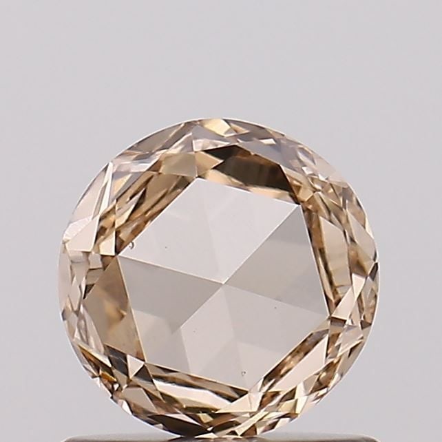Loose Diamond - ROSE 0.58ct Fancy Light Brown VS1: Loose Diamond - ROSE 0.58ct Fancy Light Brown VS1 Source: This is a real non-mined Diamond that has been grown in a lab Shape: ROSE Carats: 0.58 Color: Fancy Light Brown Certification: NONE Video: