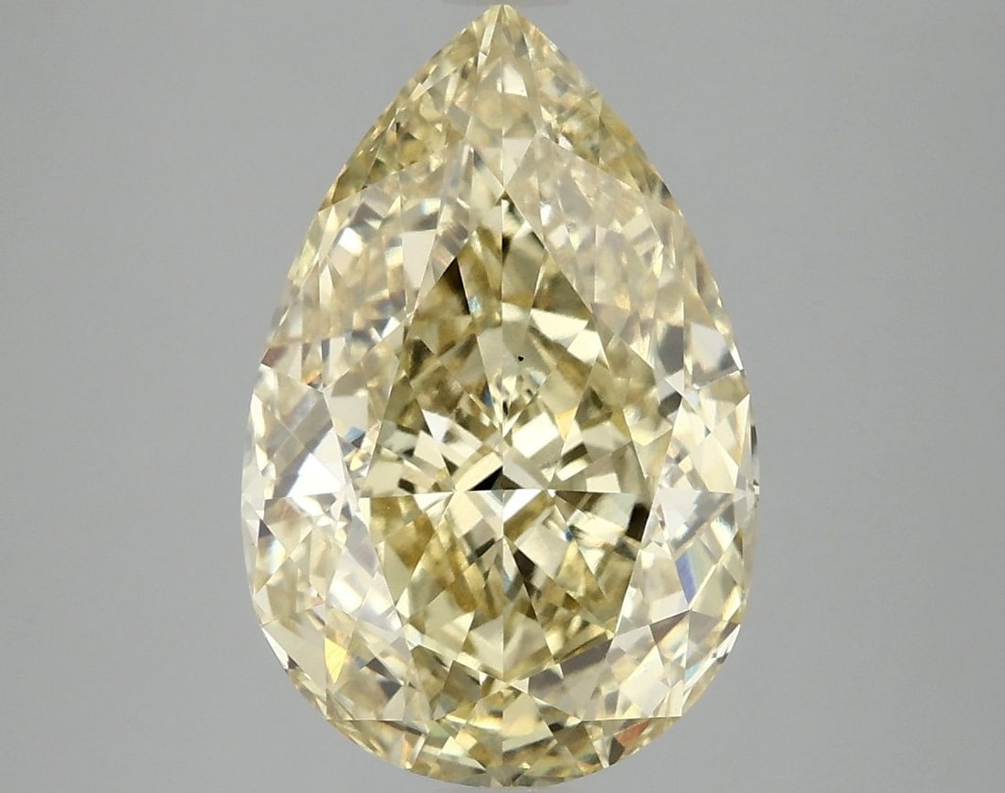 Loose Diamond - PEAR 5.02ct Fancy Vivid Yellow VS1: Loose Diamond - PEAR 5.02ct Fancy Vivid Yellow VS1 Source: This is a real non-mined Diamond that has been grown in a lab Shape: PEAR Carats: 5.02 Color: Fancy Vivid Yellow Certification: IGI Video: