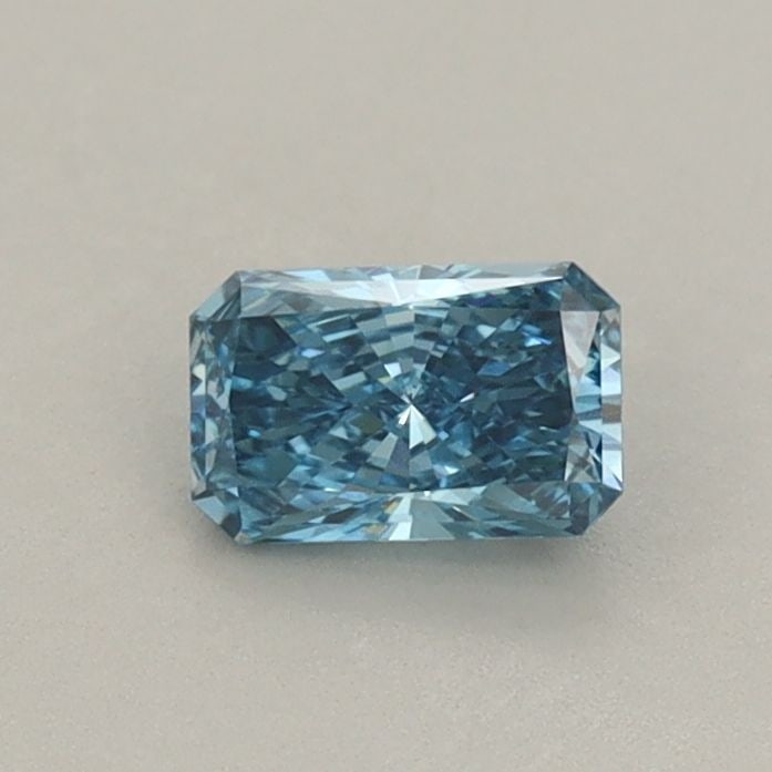 Loose Diamond - RADIANT 0.39ct Fancy Vivid Blue VVS2: Loose Diamond - RADIANT 0.39ct Fancy Vivid Blue VVS2 Source: This is a real non-mined Diamond that has been grown in a lab Shape: RADIANT Carats: 0.39 Color: Fancy Vivid Blue Certification: IGI Video: