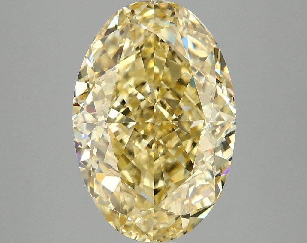 Loose Diamond - OVAL 4.05ct Fancy Vivid Yellow VS1: Loose Diamond - OVAL 4.05ct Fancy Vivid Yellow VS1 Source: This is a real non-mined Diamond that has been grown in a lab Shape: OVAL Carats: 4.05 Color: Fancy Vivid Yellow Certification: IGI Video: