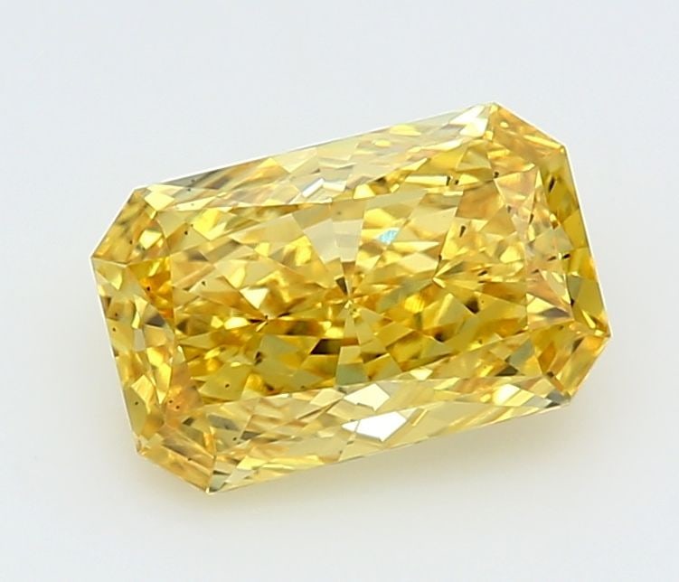 Loose Diamond - RADIANT 2.1ct Fancy Vivid Yellow SI1: Loose Diamond - RADIANT 2.1ct Fancy Vivid Yellow SI1 Source: This is a real non-mined Diamond that has been grown in a lab Shape: RADIANT Carats: 2.1 Color: Fancy Vivid Yellow Certification: IGI Video
