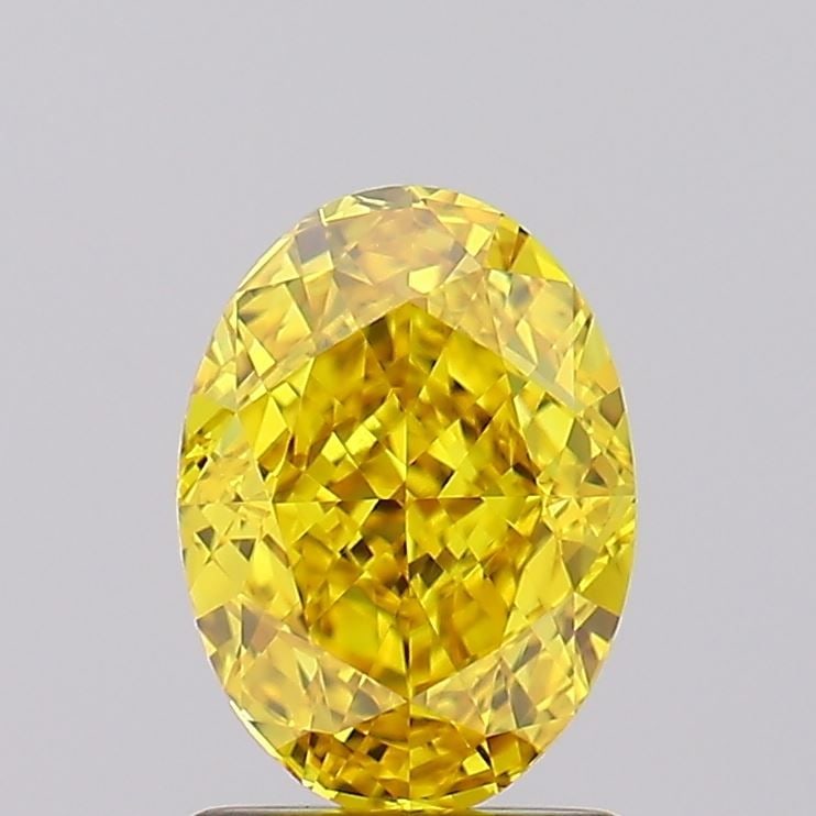 Loose Diamond - OVAL 1.67ct Fancy Vivid Yellow VVS2: Loose Diamond - OVAL 1.67ct Fancy Vivid Yellow VVS2 Source: This is a real non-mined Diamond that has been grown in a lab Shape: OVAL Carats: 1.67 Color: Fancy Vivid Yellow Certification: IGI Video: