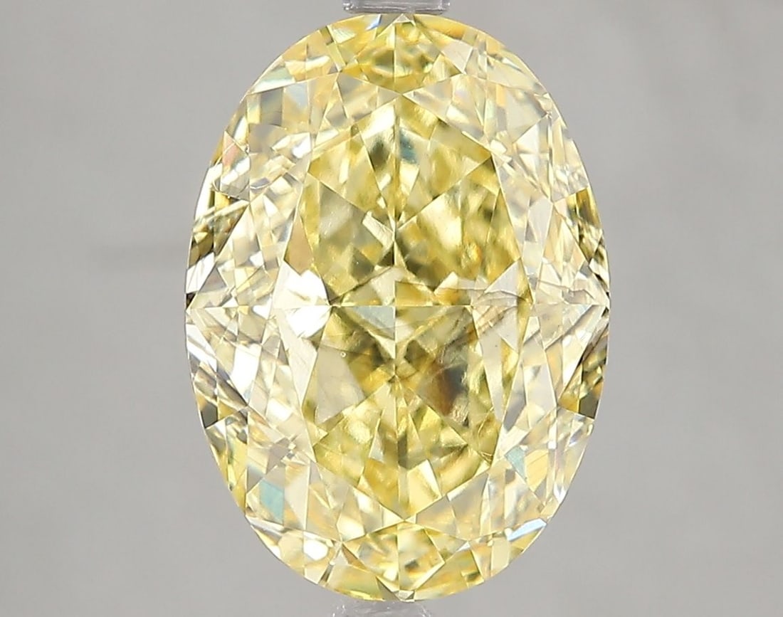 Loose Diamond - OVAL 5.02ct Fancy Intense Yellow SI1: Loose Diamond - OVAL 5.02ct Fancy Intense Yellow SI1 Source: This is a real non-mined Diamond that has been grown in a lab Shape: OVAL Carats: 5.02 Color: Fancy Intense Yellow Certification: IGI Video