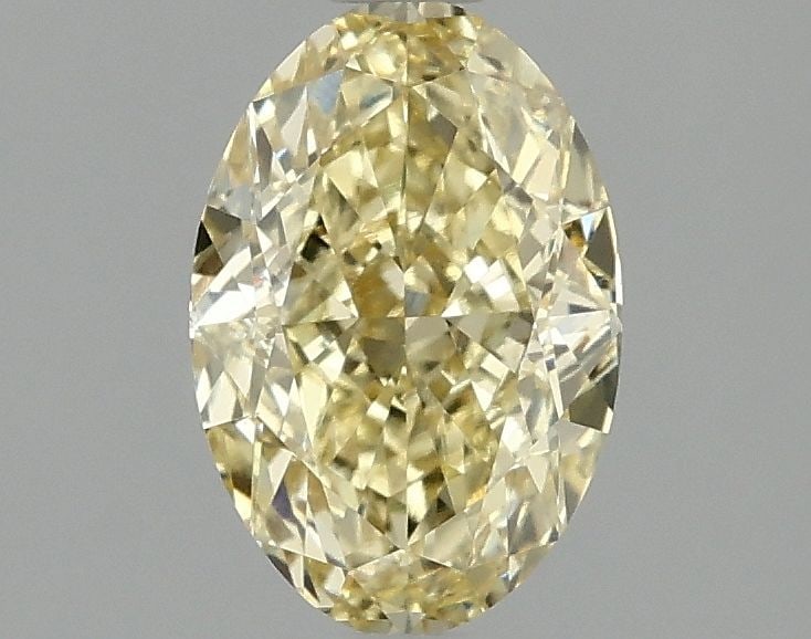 Loose Diamond - OVAL 1.57ct Fancy Vivid Yellow VS1: Loose Diamond - OVAL 1.57ct Fancy Vivid Yellow VS1 Source: This is a real non-mined Diamond that has been grown in a lab Shape: OVAL Carats: 1.57 Color: Fancy Vivid Yellow Certification: IGI Video: