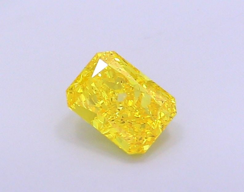 Loose Diamond - RADIANT 1.18ct Fancy Vivid Yellow VS2: Loose Diamond - RADIANT 1.18ct Fancy Vivid Yellow VS2 Source: This is a real non-mined Diamond that has been grown in a lab Shape: RADIANT Carats: 1.18 Color: Fancy Vivid Yellow Certification: IGI Vid
