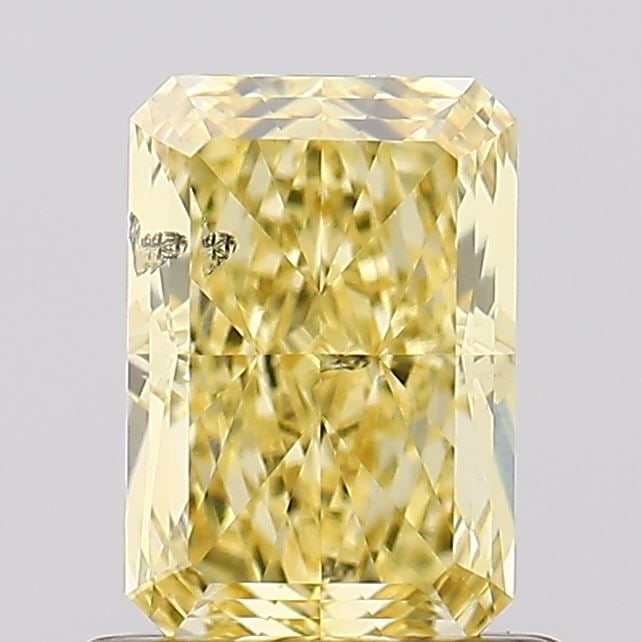 Loose Diamond - RADIANT 1.02ct Fancy Vivid Yellow SI2: Loose Diamond - RADIANT 1.02ct Fancy Vivid Yellow SI2 Source: This is a real non-mined Diamond that has been grown in a lab Shape: RADIANT Carats: 1.02 Color: Fancy Vivid Yellow Certification: IGI Vid