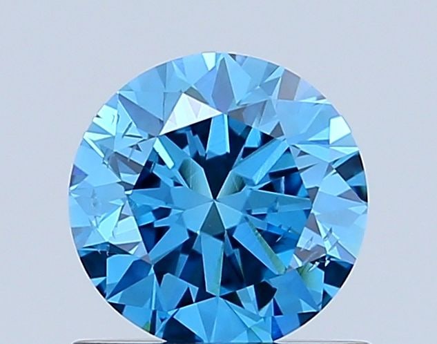 Loose Diamond - ROUND 0.77ct Fancy Vivid Blue SI1: Loose Diamond - ROUND 0.77ct Fancy Vivid Blue SI1 Source: This is a real non-mined Diamond that has been grown in a lab Shape: ROUND Carats: 0.77 Color: Fancy Vivid Blue Certification: NONE Video: