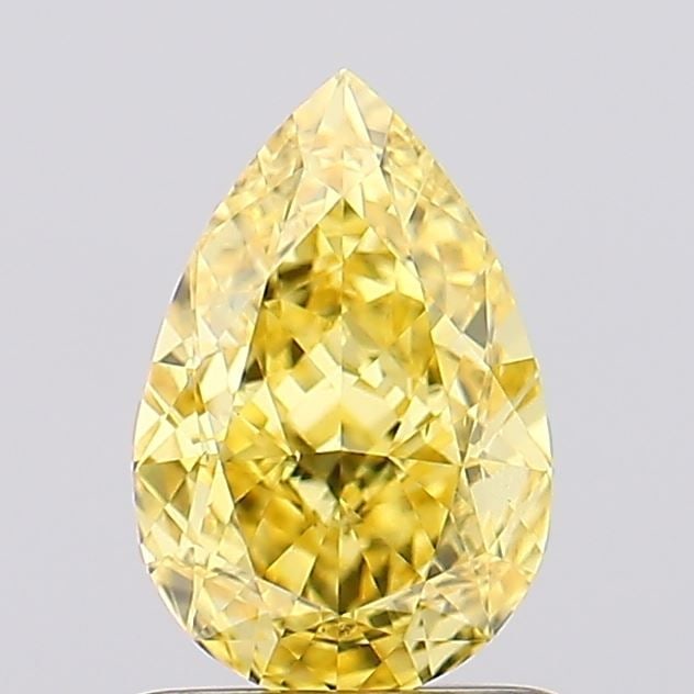 Loose Diamond - PEAR 1.25ct Fancy Vivid Yellow VS2: Loose Diamond - PEAR 1.25ct Fancy Vivid Yellow VS2 Source: This is a real non-mined Diamond that has been grown in a lab Shape: PEAR Carats: 1.25 Color: Fancy Vivid Yellow Certification: IGI Video: