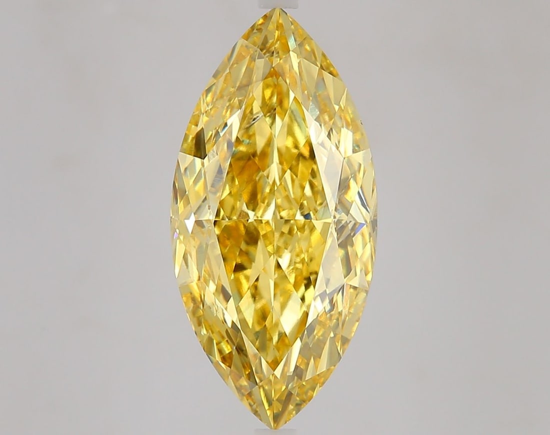 Loose Diamond - MARQUISE 6.02ct Fancy Vivid Yellow VS2: Loose Diamond - MARQUISE 6.02ct Fancy Vivid Yellow VS2 Source: This is a real non-mined Diamond that has been grown in a lab Shape: MARQUISE Carats: 6.02 Color: Fancy Vivid Yellow Certification: IGI V