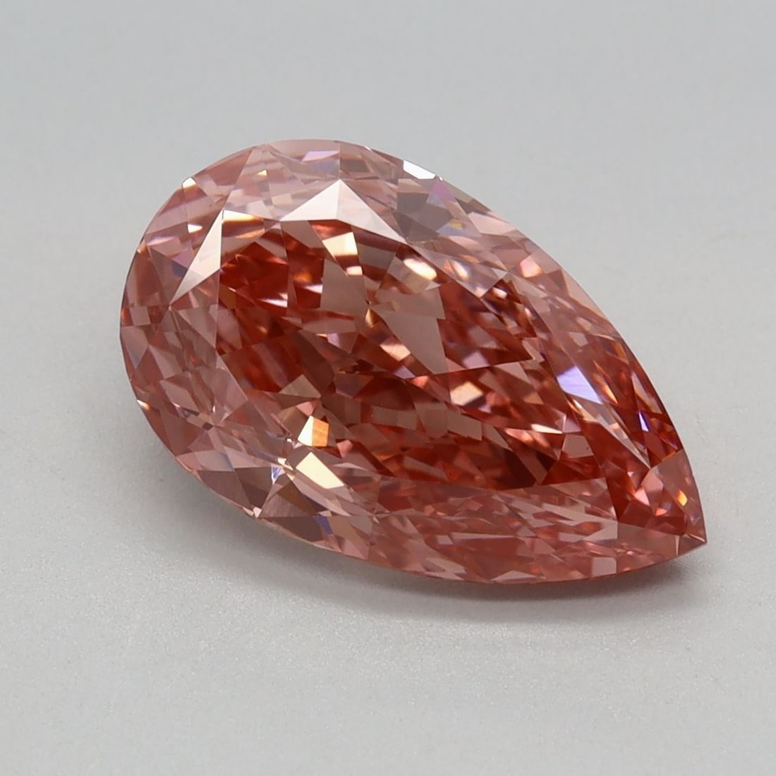 Loose Diamond - PEAR 2.57ct Fancy Vivid Brownish Pink VVS2: Loose Diamond - PEAR 2.57ct Fancy Vivid Brownish Pink VVS2 Source: This is a real non-mined Diamond that has been grown in a lab Shape: PEAR Carats: 2.57 Color: Fancy Vivid Brownish Pink Certification