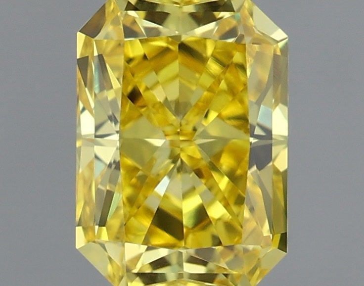 Loose Diamond - RADIANT 0.72ct Fancy Vivid Yellow VVS2: Loose Diamond - RADIANT 0.72ct Fancy Vivid Yellow VVS2 Source: This is a real non-mined Diamond that has been grown in a lab Shape: RADIANT Carats: 0.72 Color: Fancy Vivid Yellow Certification: IGI Vi