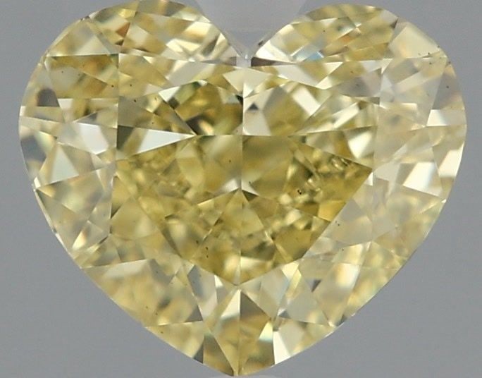Loose Diamond - HEART 2.09ct Fancy Intense Yellow VS1: Loose Diamond - HEART 2.09ct Fancy Intense Yellow VS1 Source: This is a real non-mined Diamond that has been grown in a lab Shape: HEART Carats: 2.09 Color: Fancy Intense Yellow Certification: IGI Vid