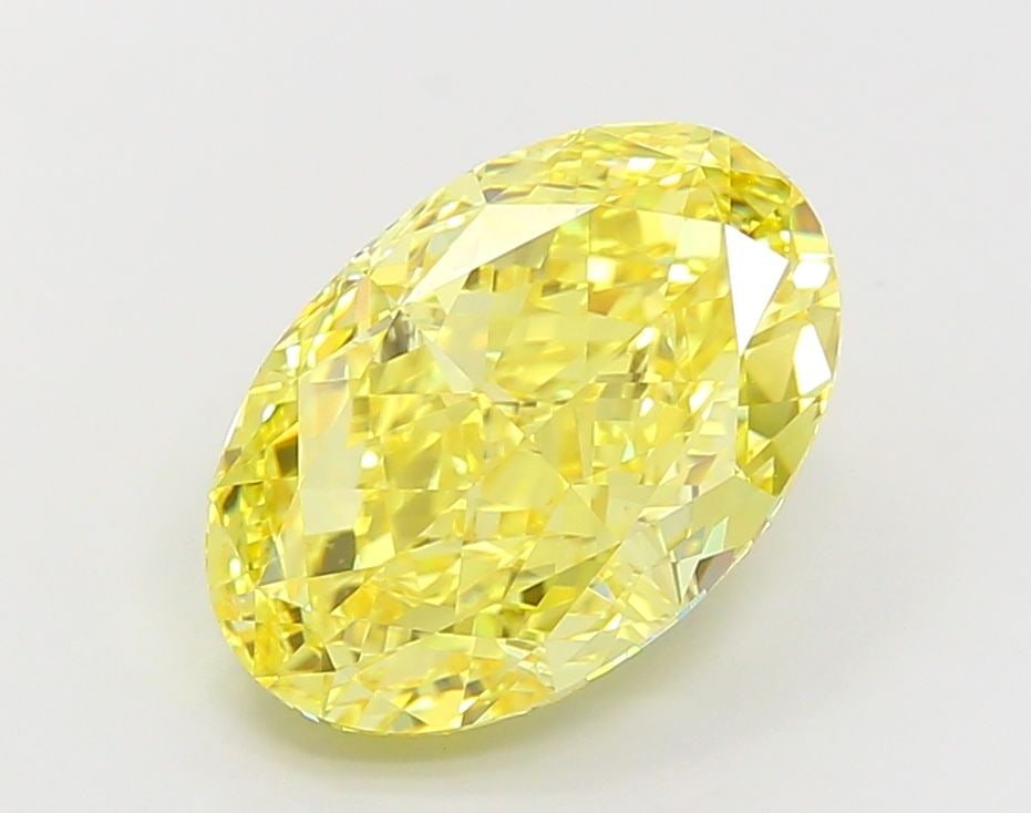 Loose Diamond - OVAL 6.15ct Fancy Vivid Yellow VVS2: Loose Diamond - OVAL 6.15ct Fancy Vivid Yellow VVS2 Source: This is a real non-mined Diamond that has been grown in a lab Shape: OVAL Carats: 6.15 Color: Fancy Vivid Yellow Certification: IGI Video:
