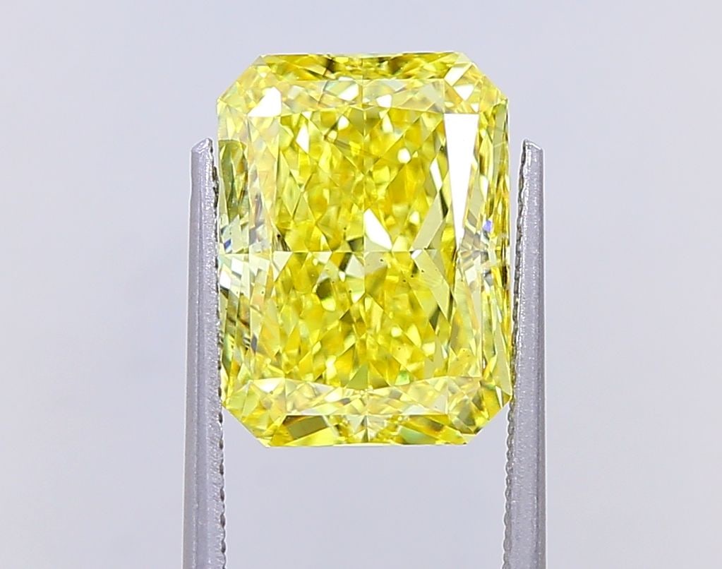 Loose Diamond - RADIANT 6.5ct Fancy Vivid Yellow SI1: Loose Diamond - RADIANT 6.5ct Fancy Vivid Yellow SI1 Source: This is a real non-mined Diamond that has been grown in a lab Shape: RADIANT Carats: 6.5 Color: Fancy Vivid Yellow Certification: IGI Video