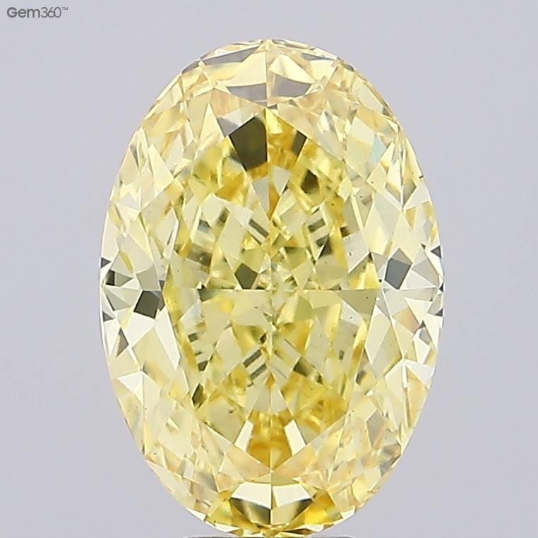 Loose Diamond - OVAL 9.4ct Fancy Vivid Yellow VS2: Loose Diamond - OVAL 9.4ct Fancy Vivid Yellow VS2 Source: This is a real non-mined Diamond that has been grown in a lab Shape: OVAL Carats: 9.4 Color: Fancy Vivid Yellow Certification: IGI Video: