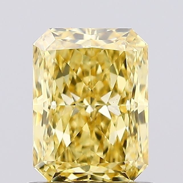 Loose Diamond - RADIANT 1.03ct Fancy Vivid Yellow VS1: Loose Diamond - RADIANT 1.03ct Fancy Vivid Yellow VS1 Source: This is a real non-mined Diamond that has been grown in a lab Shape: RADIANT Carats: 1.03 Color: Fancy Vivid Yellow Certification: IGI Vid