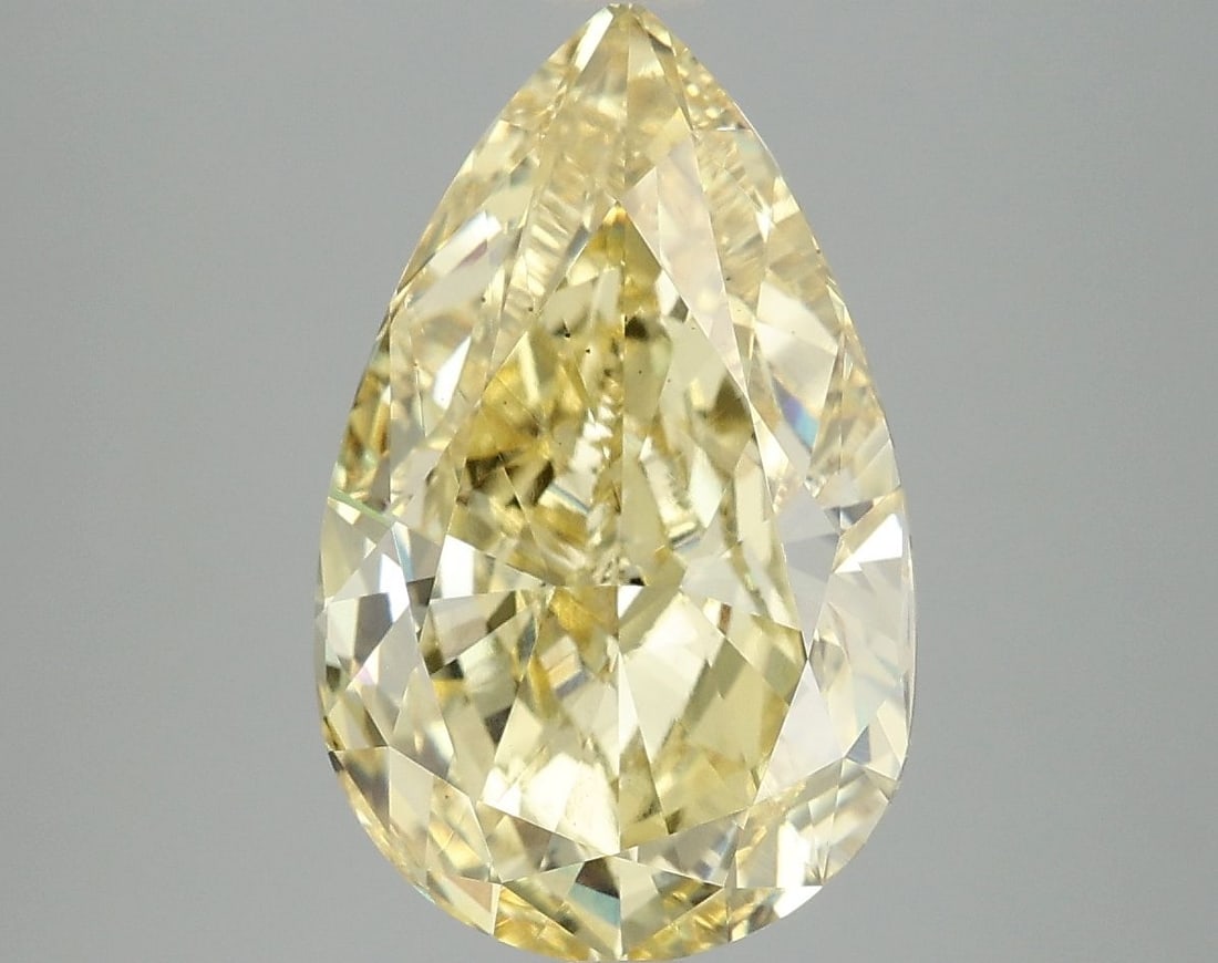 Loose Diamond - PEAR 5.01ct Fancy Vivid Yellow VS2: Loose Diamond - PEAR 5.01ct Fancy Vivid Yellow VS2 Source: This is a real non-mined Diamond that has been grown in a lab Shape: PEAR Carats: 5.01 Color: Fancy Vivid Yellow Certification: IGI Video: