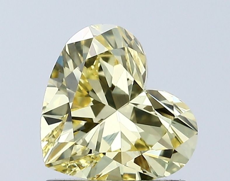 Loose Diamond - HEART 1.01ct Fancy Vivid Yellow VS1: Loose Diamond - HEART 1.01ct Fancy Vivid Yellow VS1 Source: This is a real non-mined Diamond that has been grown in a lab Shape: HEART Carats: 1.01 Color: Fancy Vivid Yellow Certification: IGI Video: