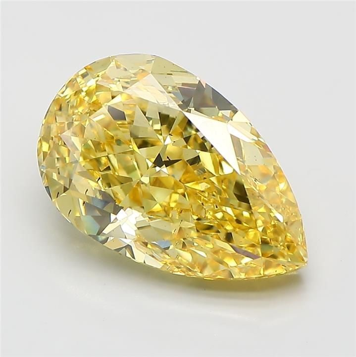 Loose Diamond - PEAR 5.22ct Fancy Vivid Yellow VS2: Loose Diamond - PEAR 5.22ct Fancy Vivid Yellow VS2 Source: This is a real non-mined Diamond that has been grown in a lab Shape: PEAR Carats: 5.22 Color: Fancy Vivid Yellow Certification: IGI Video: