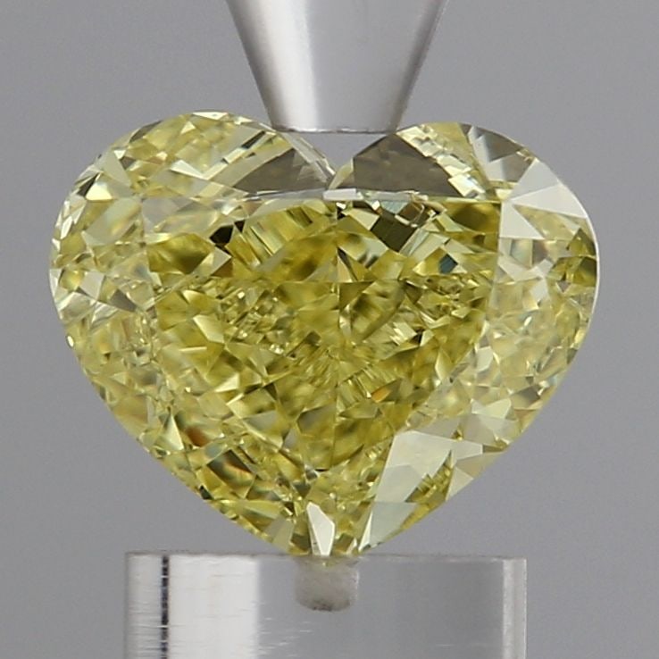 Loose Diamond - HEART 1.58ct Fancy Vivid Yellow SI1: Loose Diamond - HEART 1.58ct Fancy Vivid Yellow SI1 Source: This is a real non-mined Diamond that has been grown in a lab Shape: HEART Carats: 1.58 Color: Fancy Vivid Yellow Certification: IGI Video: