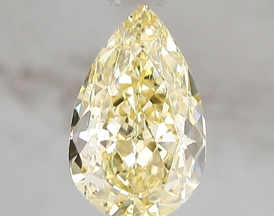 Loose Diamond - PEAR 1.6ct Fancy Vivid Yellow VS1: Loose Diamond - PEAR 1.6ct Fancy Vivid Yellow VS1 Source: This is a real non-mined Diamond that has been grown in a lab Shape: PEAR Carats: 1.6 Color: Fancy Vivid Yellow Certification: IGI Video: