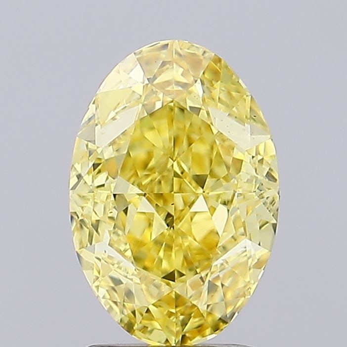 Loose Diamond - OVAL 2.11ct Fancy Vivid Yellow VS1: Loose Diamond - OVAL 2.11ct Fancy Vivid Yellow VS1 Source: This is a real non-mined Diamond that has been grown in a lab Shape: OVAL Carats: 2.11 Color: Fancy Vivid Yellow Certification: IGI Video: