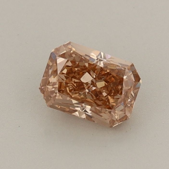 Loose Diamond - RADIANT 0.57ct Fancy Light Brown VS1: Loose Diamond - RADIANT 0.57ct Fancy Light Brown VS1 Source: This is a real non-mined Diamond that has been grown in a lab Shape: RADIANT Carats: 0.57 Color: Fancy Light Brown Certification: IGI Video