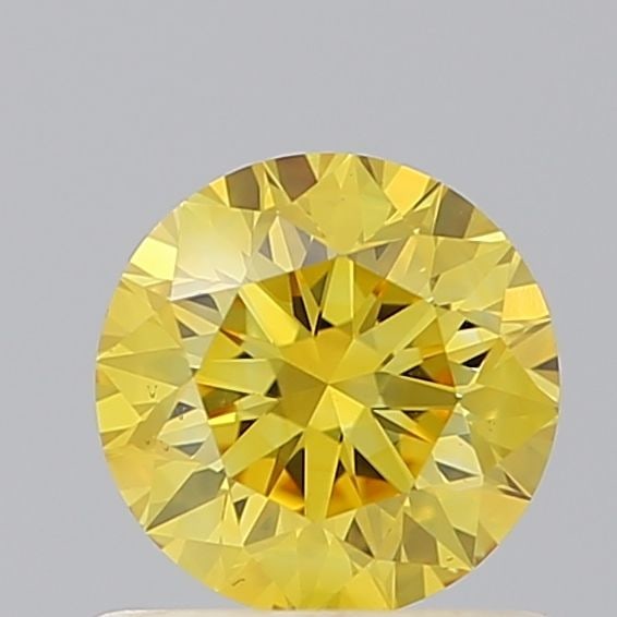 Loose Diamond - ROUND 0.65ct Fancy Vivid Yellow VS2: Loose Diamond - ROUND 0.65ct Fancy Vivid Yellow VS2 Source: This is a real non-mined Diamond that has been grown in a lab Shape: ROUND Carats: 0.65 Color: Fancy Vivid Yellow Certification: IGI Video: