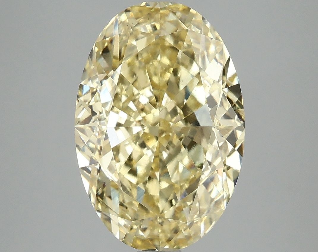 Loose Diamond - OVAL 5.06ct Fancy Vivid Yellow VS2: Loose Diamond - OVAL 5.06ct Fancy Vivid Yellow VS2 Source: This is a real non-mined Diamond that has been grown in a lab Shape: OVAL Carats: 5.06 Color: Fancy Vivid Yellow Certification: IGI Video: