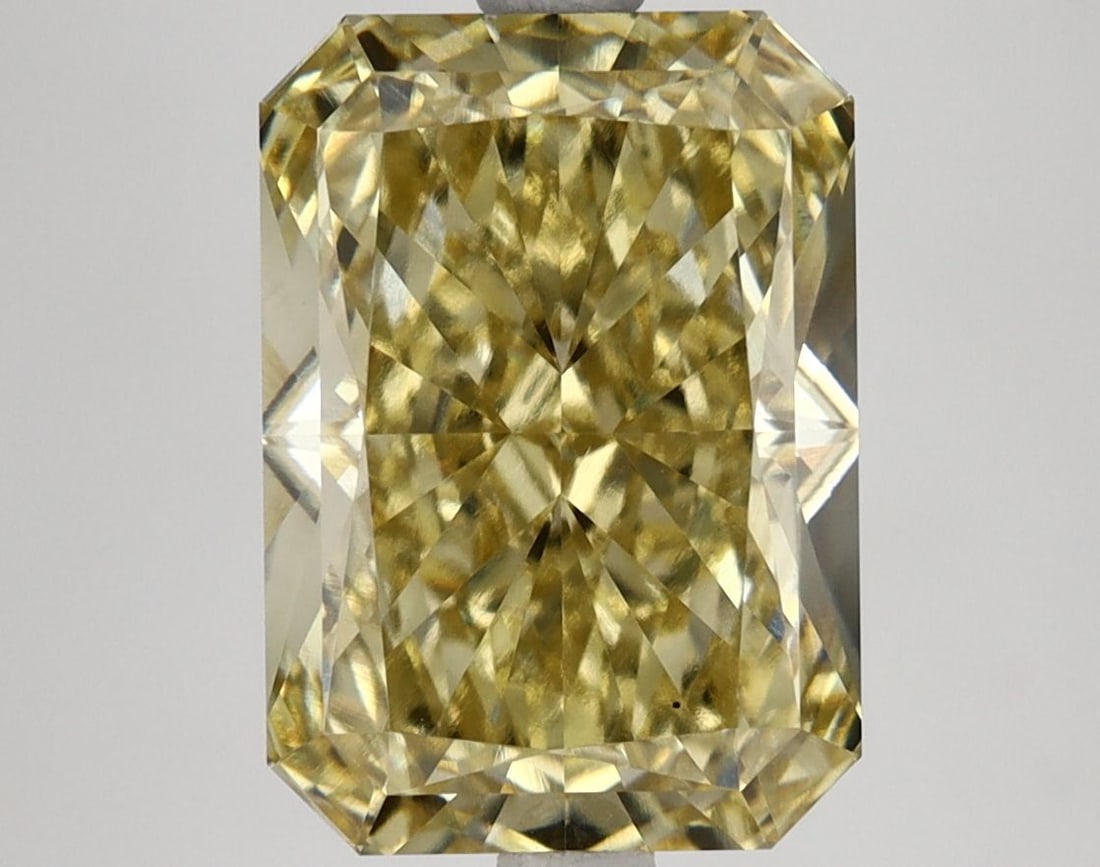 Loose Diamond - RADIANT 5.18ct Fancy Vivid Yellow VS1: Loose Diamond - RADIANT 5.18ct Fancy Vivid Yellow VS1 Source: This is a real non-mined Diamond that has been grown in a lab Shape: RADIANT Carats: 5.18 Color: Fancy Vivid Yellow Certification: IGI Vid