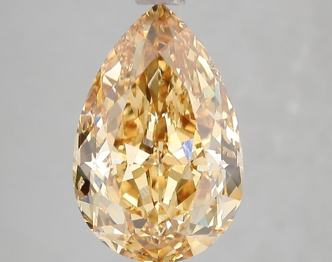 Loose Diamond - PEAR 5.04ct Fancy Intense Yellowish Orange VS2: Loose Diamond - PEAR 5.04ct Fancy Intense Yellowish Orange VS2 Source: This is a real non-mined Diamond that has been grown in a lab Shape: PEAR Carats: 5.04 Color: Fancy Intense Yellowish Orange Cert