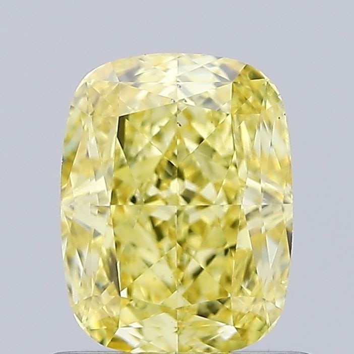 Loose Diamond - CUSHION MODIFIED 0.93ct Fancy Vivid Yellow VS2: Loose Diamond - CUSHION MODIFIED 0.93ct Fancy Vivid Yellow VS2 Source: This is a real non-mined Diamond that has been grown in a lab Shape: CUSHION MODIFIED Carats: 0.93 Color: Fancy Vivid Yellow Cert