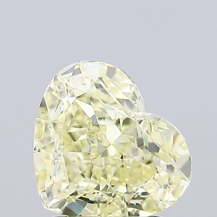 Loose Diamond - HEART 2.03ct Fancy Light Yellow VVS2: Loose Diamond - HEART 2.03ct Fancy Light Yellow VVS2 Source: This is a real non-mined Diamond that has been grown in a lab Shape: HEART Carats: 2.03 Color: Fancy Light Yellow Certification: IGI Video: