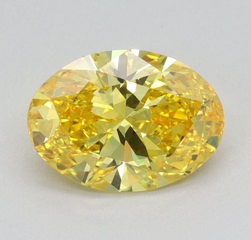 Loose Diamond - OVAL 0.97ct Fancy Vivid Yellow VS1: Loose Diamond - OVAL 0.97ct Fancy Vivid Yellow VS1 Source: This is a real non-mined Diamond that has been grown in a lab Shape: OVAL Carats: 0.97 Color: Fancy Vivid Yellow Certification: IGI Video: