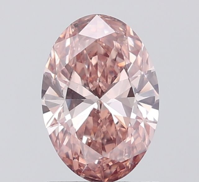 Loose Diamond - OVAL 1.16ct Fancy Pinkish Brown VS1: Loose Diamond - OVAL 1.16ct Fancy Pinkish Brown VS1 Source: This is a real non-mined Diamond that has been grown in a lab Shape: OVAL Carats: 1.16 Color: Fancy Pinkish Brown Certification: IGI Video: