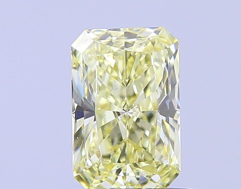 Loose Diamond - RADIANT 0.82ct Fancy Light Yellow VS2: Loose Diamond - RADIANT 0.82ct Fancy Light Yellow VS2 Source: This is a real non-mined Diamond that has been grown in a lab Shape: RADIANT Carats: 0.82 Color: Fancy Light Yellow Certification: IGI Vid