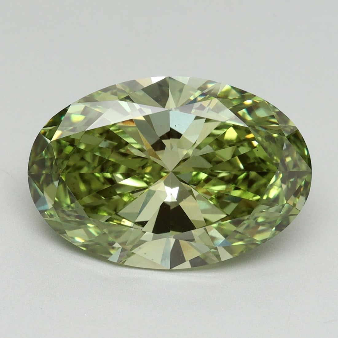 Loose Diamond - OVAL 5.08ct Fancy Vivid Green VS1: Loose Diamond - OVAL 5.08ct Fancy Vivid Green VS1 Source: This is a real non-mined Diamond that has been grown in a lab Shape: OVAL Carats: 5.08 Color: Fancy Vivid Green Certification: IGI Video: