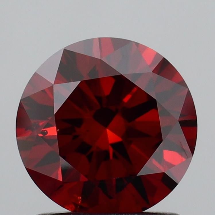 Loose Diamond - ROUND 1.27ct Fancy Deep Orange SI1: Loose Diamond - ROUND 1.27ct Fancy Deep Orange SI1 Source: This is a real non-mined Diamond that has been grown in a lab Shape: ROUND Carats: 1.27 Color: Fancy Deep Orange Certification: IGI Video: