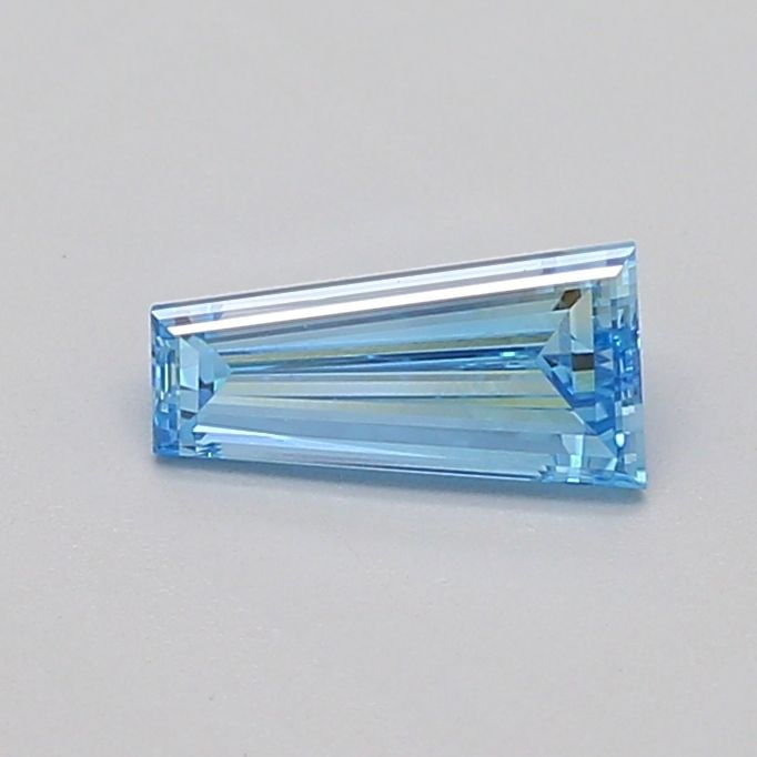 Loose Diamond - TAPERED BAGUETTE 0.54ct Fancy Vivid Blue VVS2: Loose Diamond - TAPERED BAGUETTE 0.54ct Fancy Vivid Blue VVS2 Source: This is a real non-mined Diamond that has been grown in a lab Shape: TAPERED BAGUETTE Carats: 0.54 Color: Fancy Vivid Blue Certifi